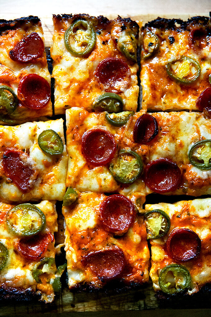 Detroit-style pizza topped with pepperoni and pickled jalapeños.