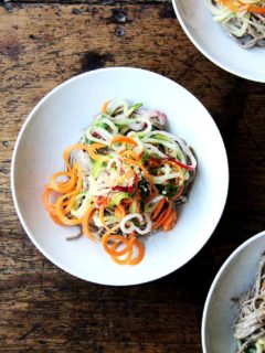 This recipe for almond-sesame soba noodles with quick-pickled vegetables is really fun and super easy. It's also a good one to rely on in the summer — it's so refreshing — and, if you subscribe to a CSA or tend a prolific garden, it makes great use of all of those carrots, cucumbers, and radishes you may find yourself up to your eyeballs in. // alexandracooks.com